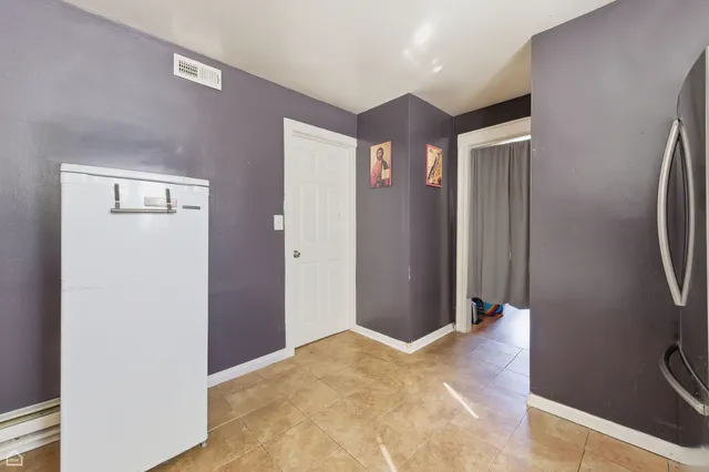 a view of hallway with a mirror