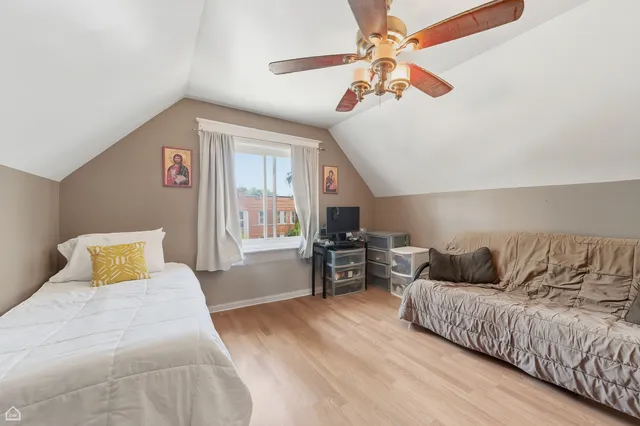 a bedroom with furniture and a couch