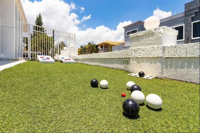 a bedroom with bed and window