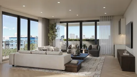 a living room with furniture large windows and a flat screen tv
