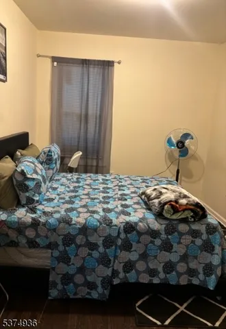 a bedroom with a bed and a cabinets