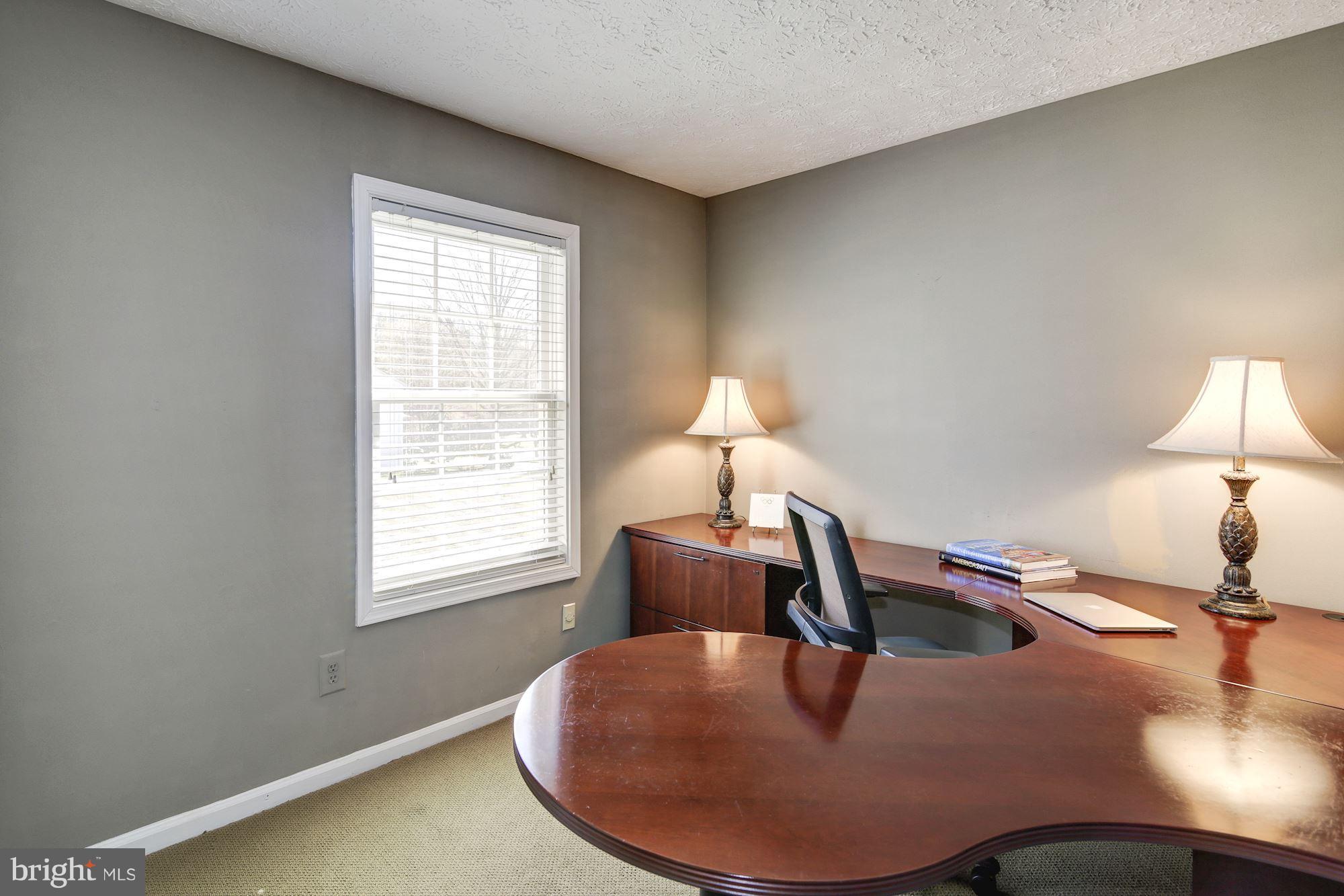 11630 Quail Ridge Court Reston, VA 20194 - Photo 17 of 29 a room with furniture and a window