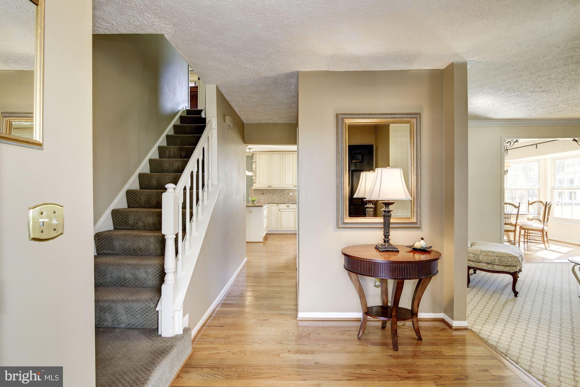 11630 Quail Ridge Court Reston, VA 20194 - Photo 3 of 29 a view of a livingroom with furniture and hardwood floor
