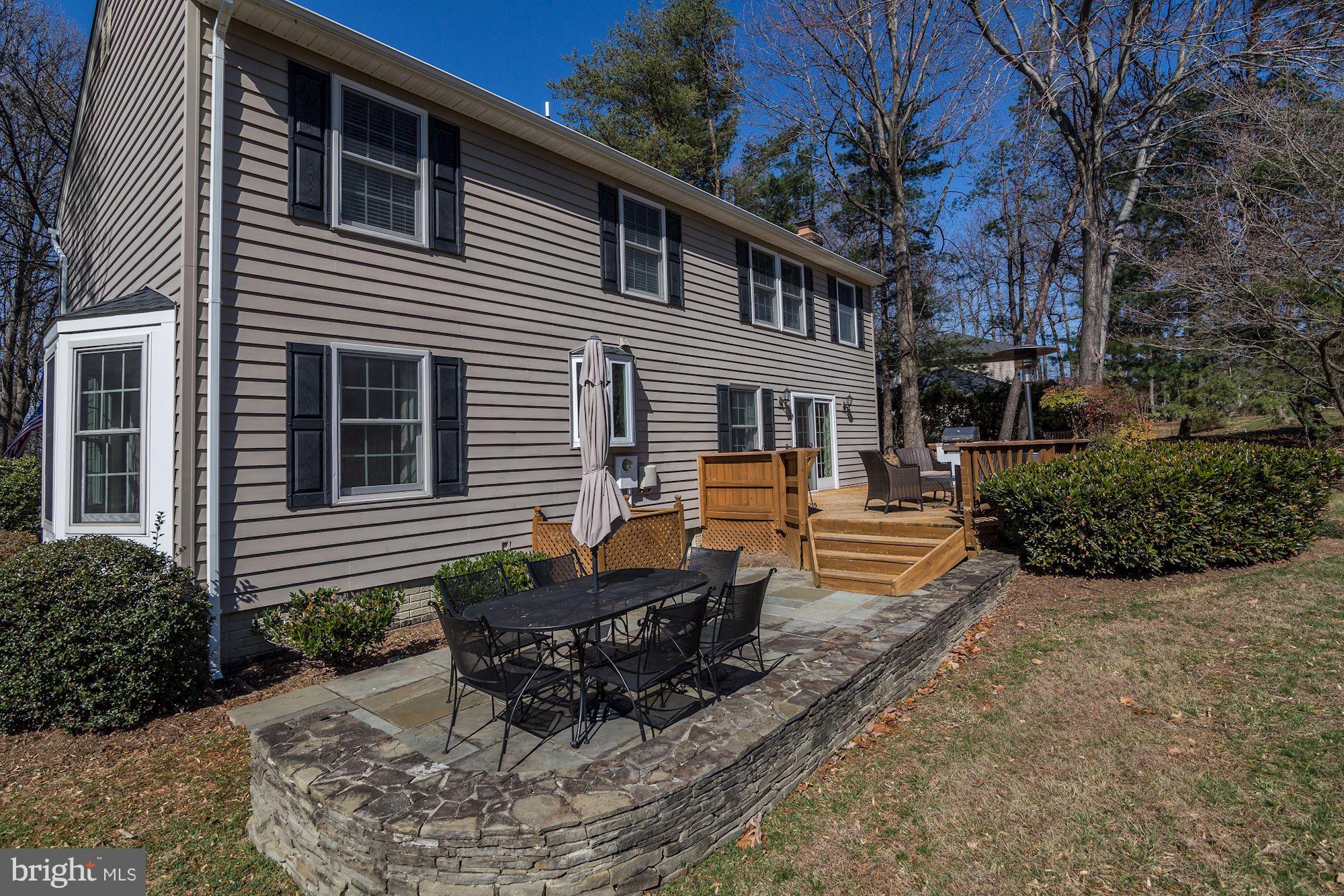 11630 Quail Ridge Court Reston, VA 20194 - Photo 26 of 29 a view of a house with backyard and sitting area