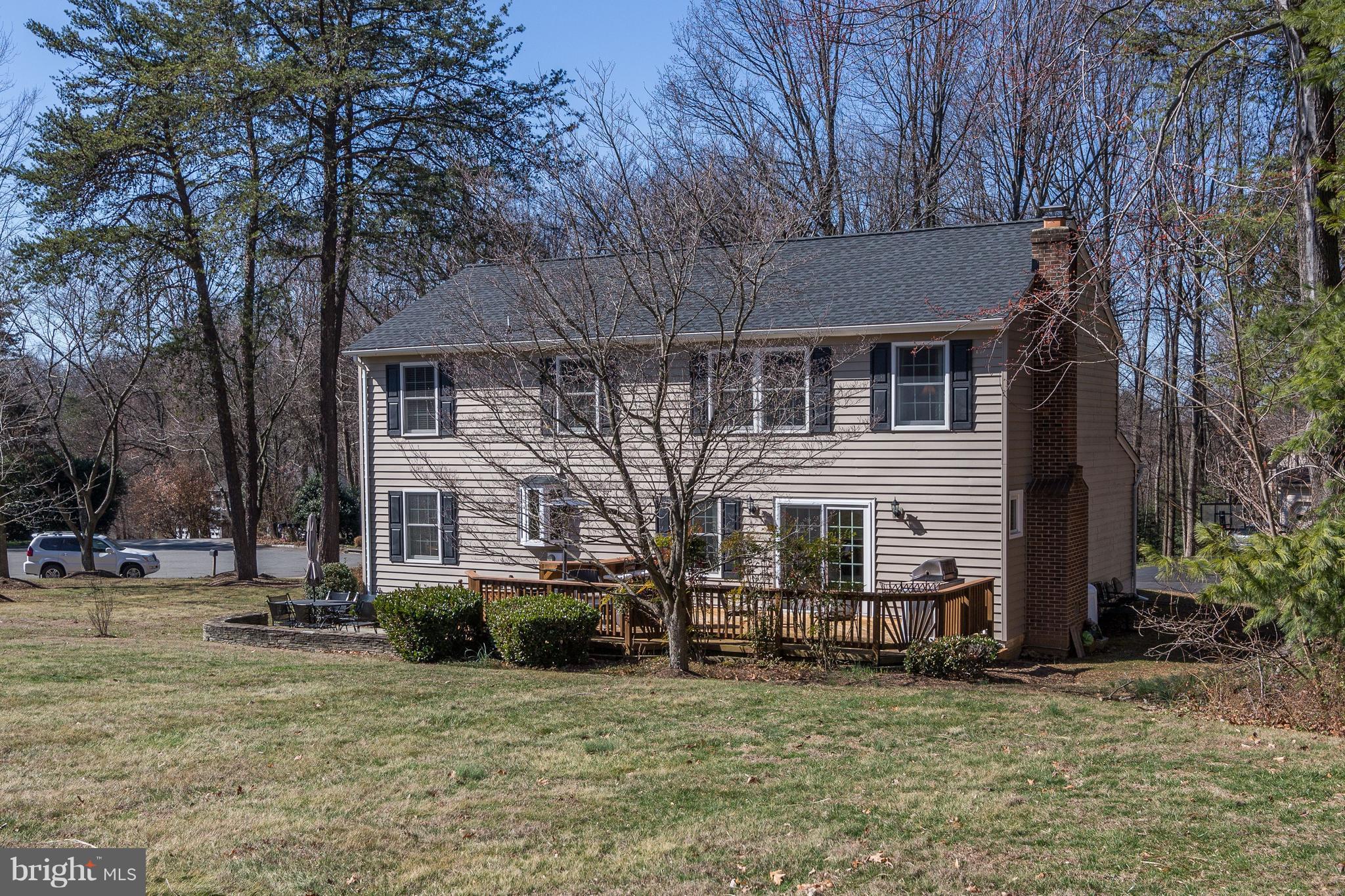 11630 Quail Ridge Court Reston, VA 20194 - Photo 27 of 29 a front view of a house with a garden