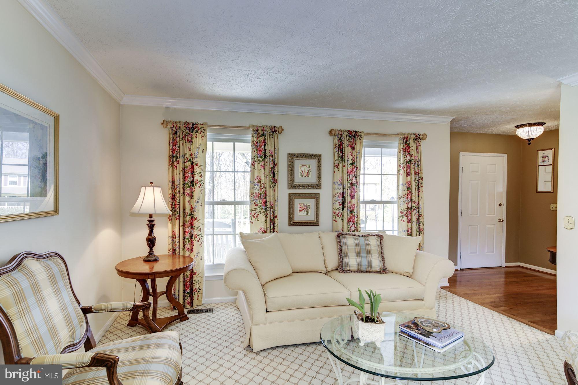 11630 Quail Ridge Court Reston, VA 20194 - Photo 4 of 29 a living room with furniture and a large window