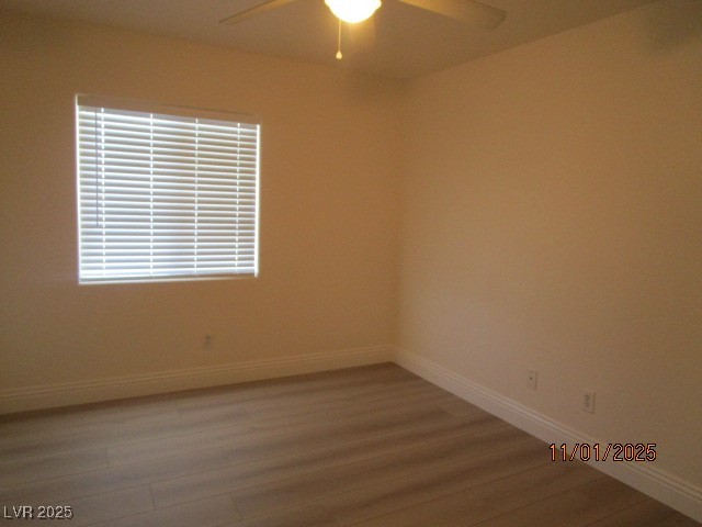 8661 Little Fox Street Las Vegas, NV 89123 - Photo 15 of 18 Unfurnished room with wood finished floors and ceiling fan