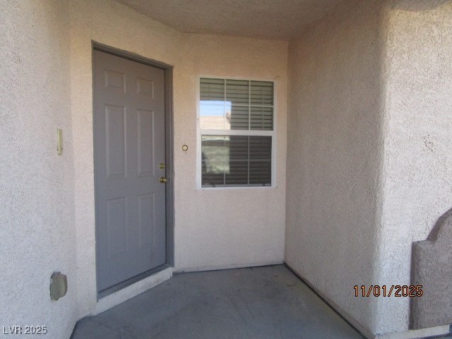8661 Little Fox Street Las Vegas, NV 89123 - Photo 2 of 18 Entrance to property with stucco siding