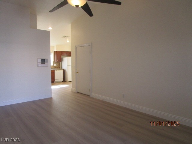 8661 Little Fox Street Las Vegas, NV 89123 - Photo 4 of 18 Spare room featuring light wood-type flooring and a ceiling fan