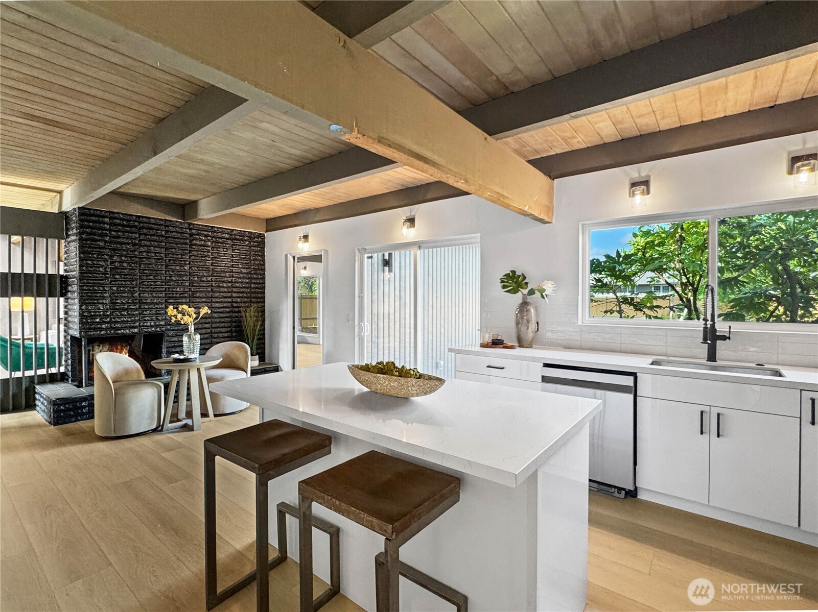 324 Valley Avenue Sumner, WA 98390 - Photo 12 of 34 a kitchen with a table chairs and wooden floor