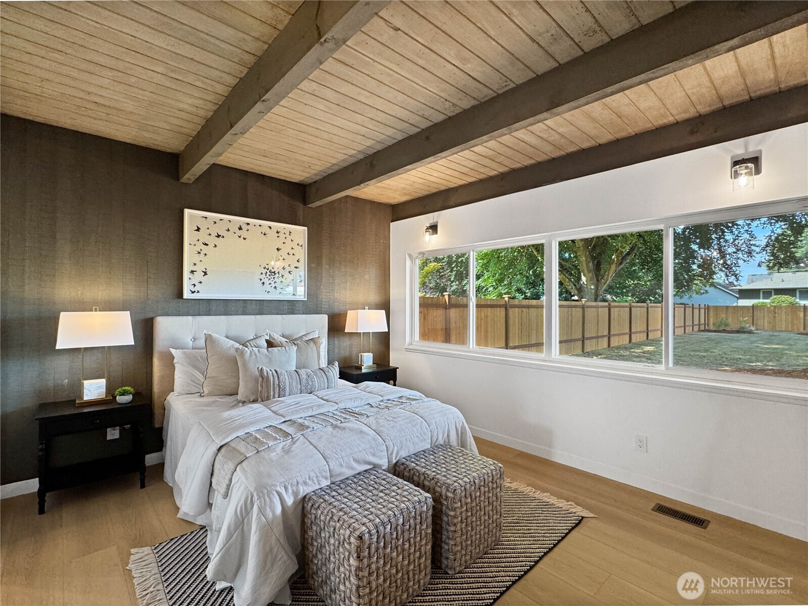 324 Valley Avenue Sumner, WA 98390 - Photo 19 of 34 a bedroom with a bed and a large window