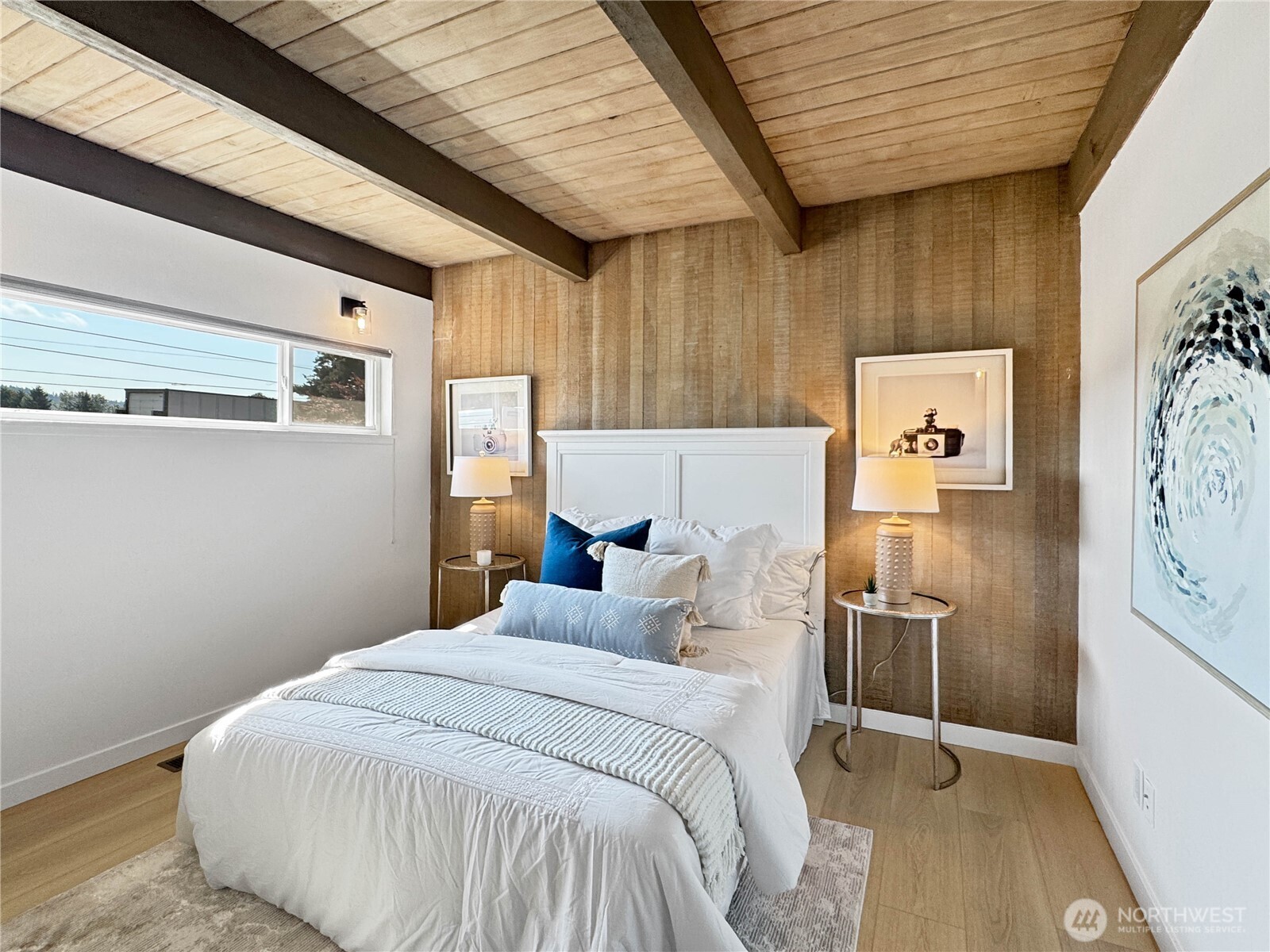 324 Valley Avenue Sumner, WA 98390 - Photo 24 of 34 a bedroom with a bed and a refrigerator