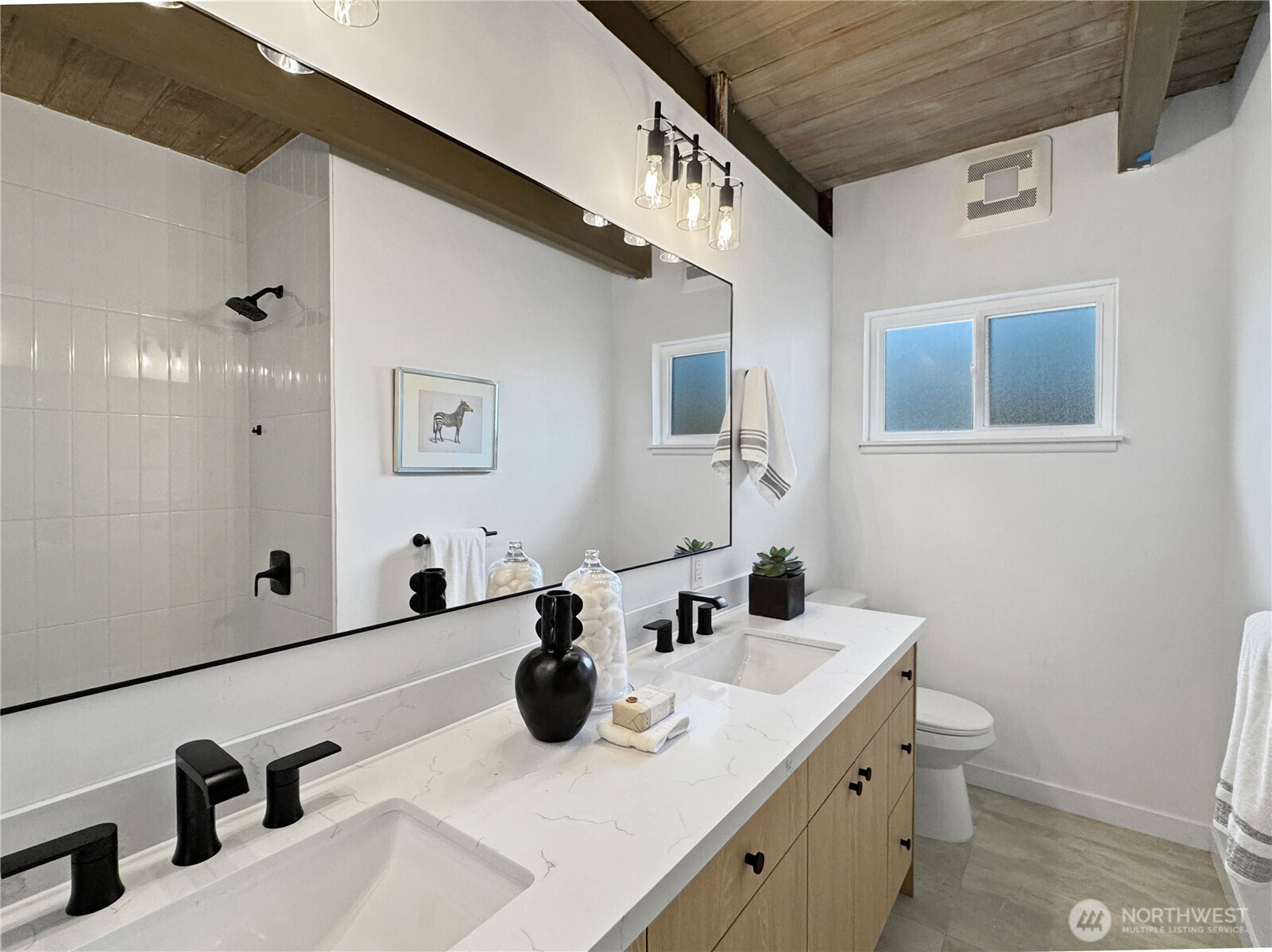 324 Valley Avenue Sumner, WA 98390 - Photo 26 of 34 a bathroom with a sink and a toilet