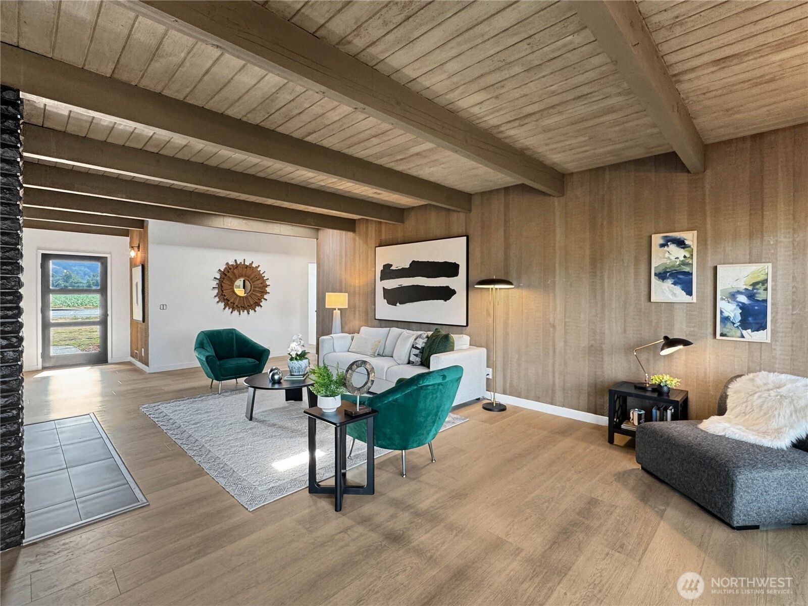 324 Valley Avenue Sumner, WA 98390 - Photo 5 of 34 a living room with furniture and a flat screen tv