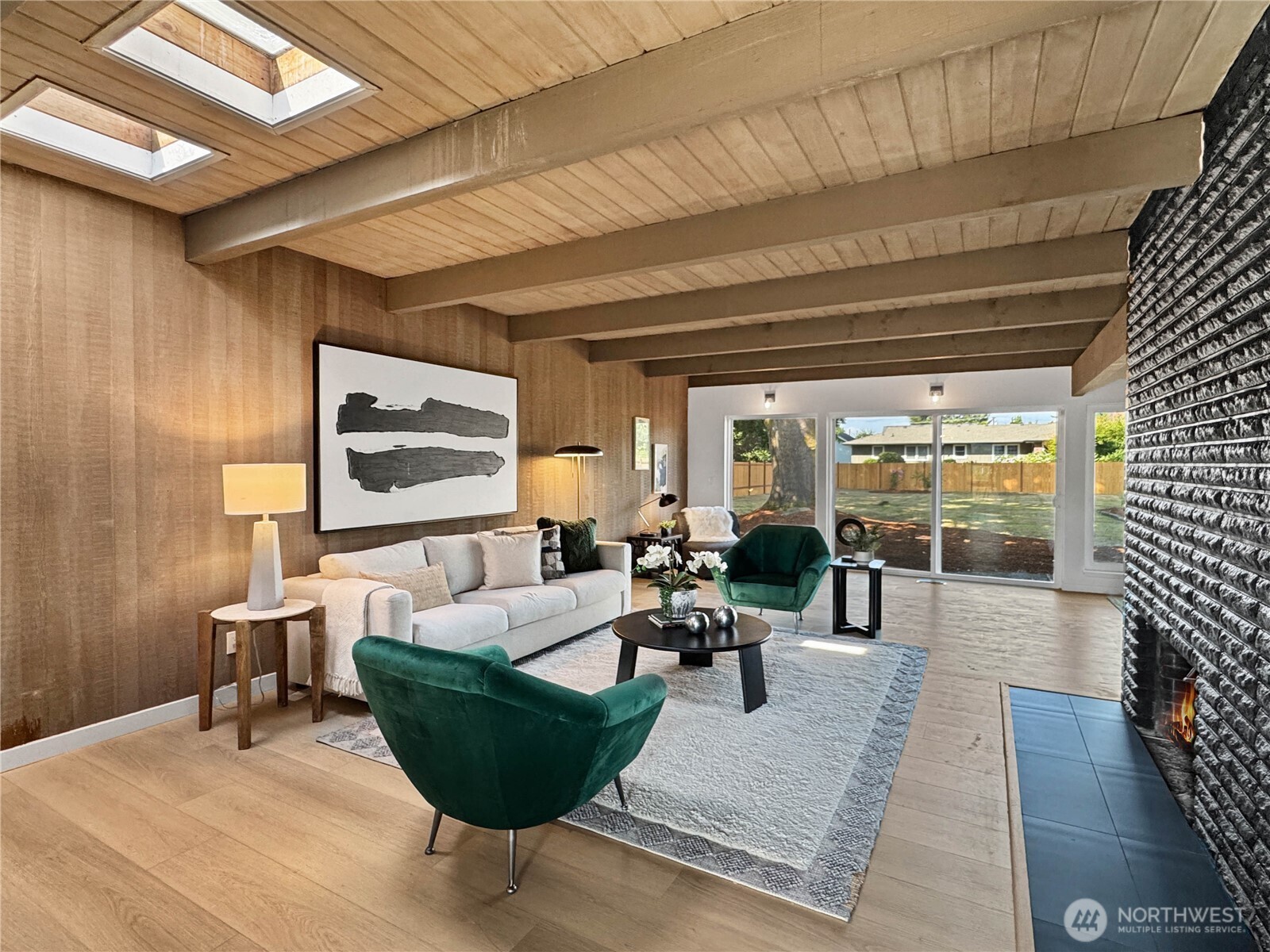324 Valley Avenue Sumner, WA 98390 - Photo 6 of 34 a living room with furniture and a large window