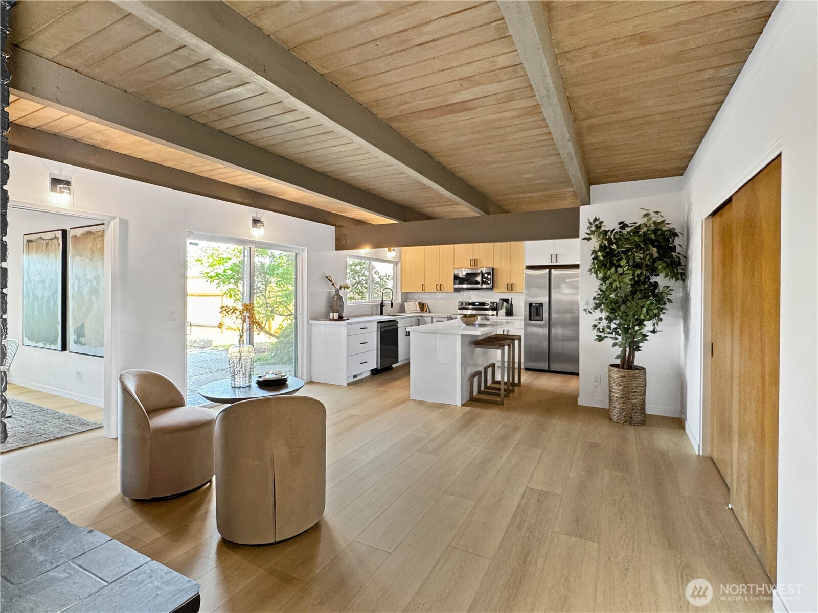 324 Valley Avenue Sumner, WA 98390 - Photo 8 of 34 a room with furniture and a large window