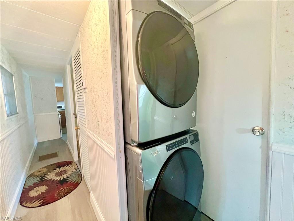 112 Cape Sable Drive Naples, FL 34104 - Photo 14 of 35 a view of a bathroom with washing machine