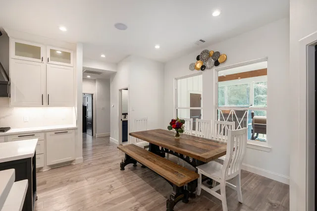 a room with furniture and wooden floor