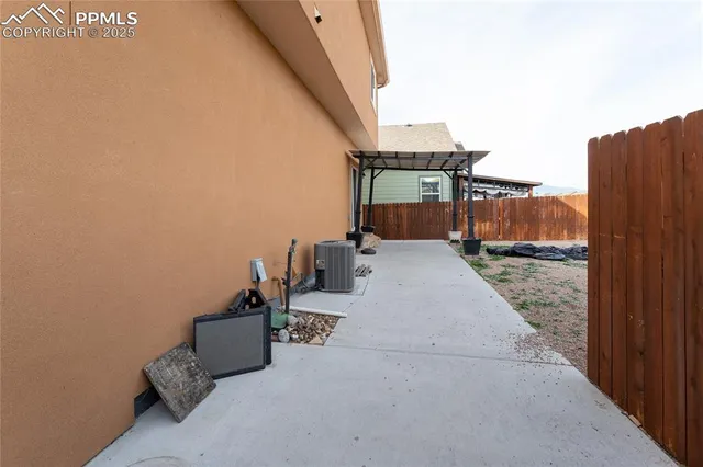 a view of a backyard of the house