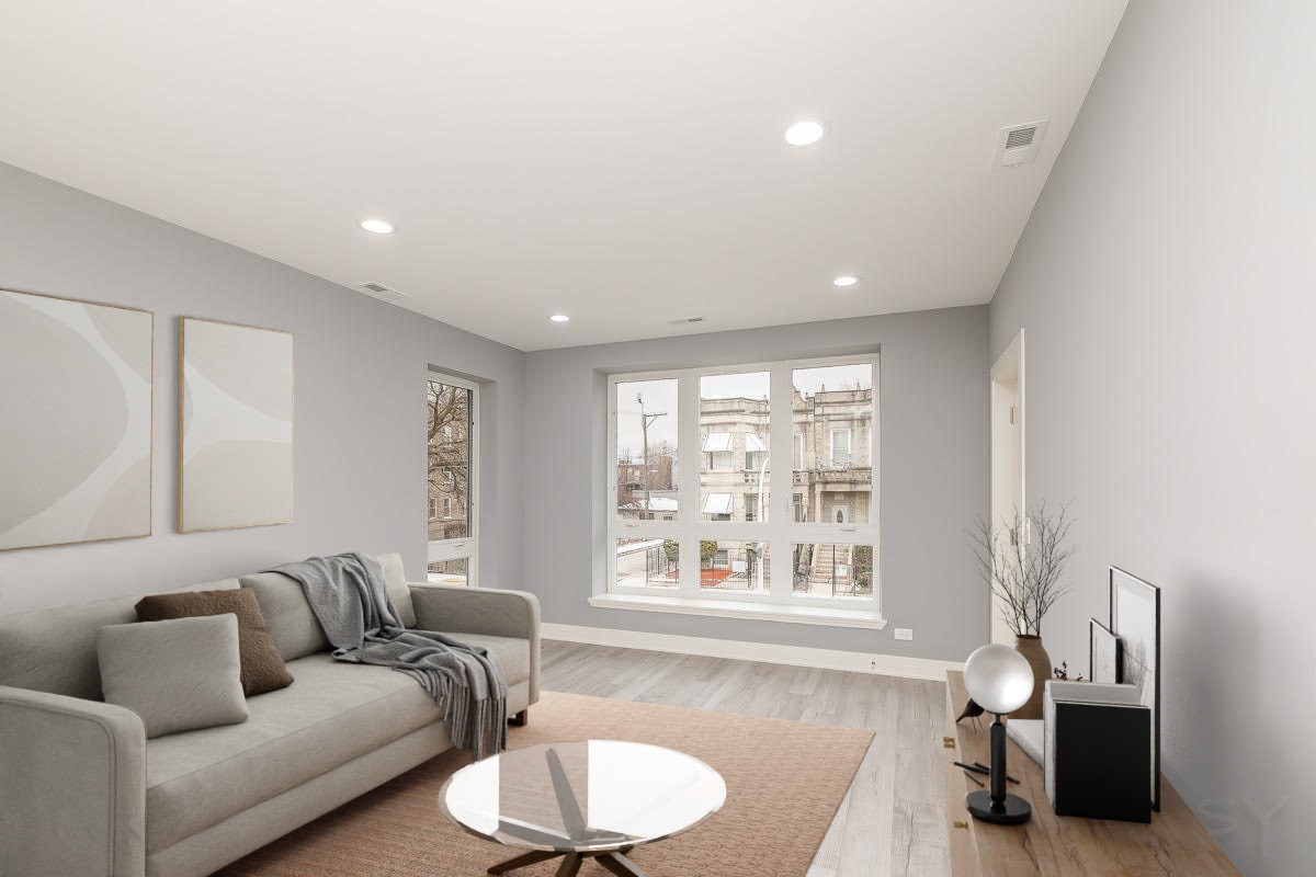 1232 South Fairfield Avenue, Unit 2 Chicago, IL 60608 - Photo 4 of 10 a living room with furniture and a large window