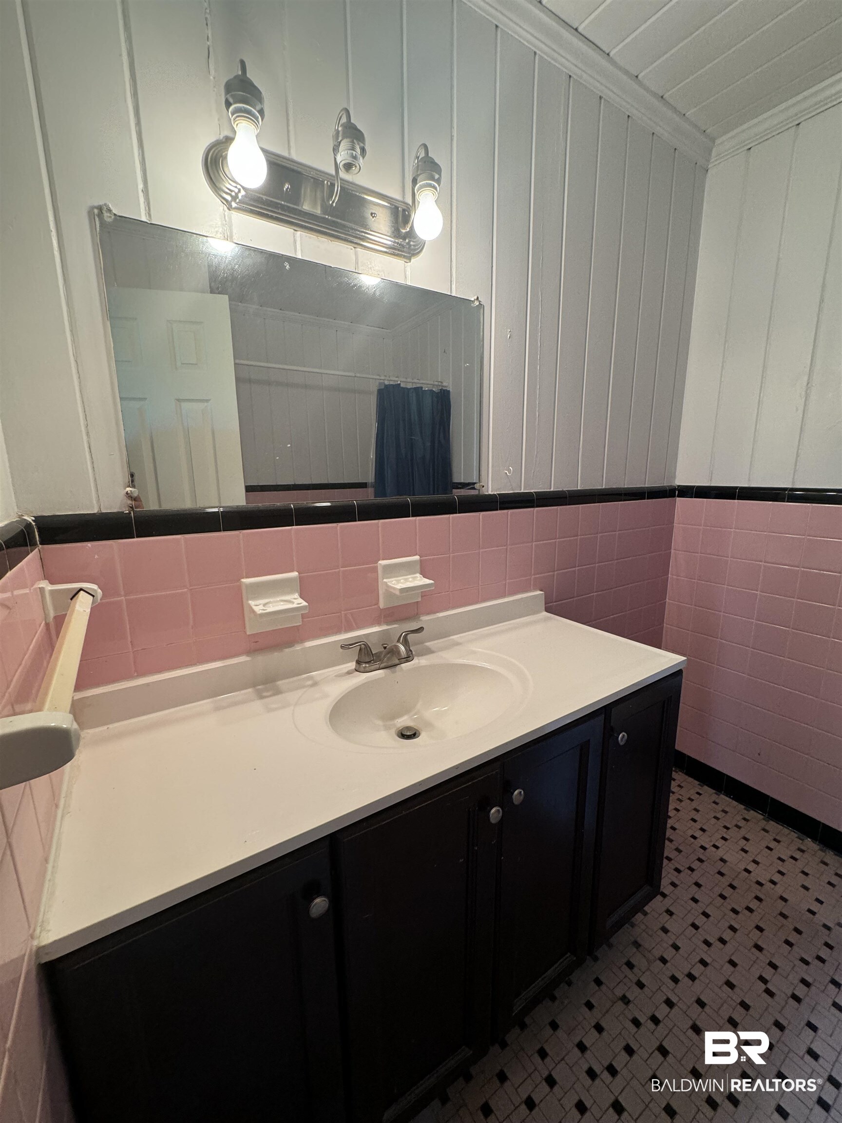 22720 Highway 31 Flomaton, AL 36441 - Photo 15 of 22 Bathroom with vanity, crown molding, and tile walls