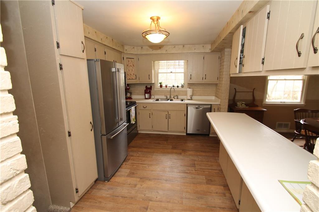 6 Carriage Road Greensburg, PA 15601 - Photo 8 of 23 kitchen with pantry and large island to work on. Stainless steel appliances