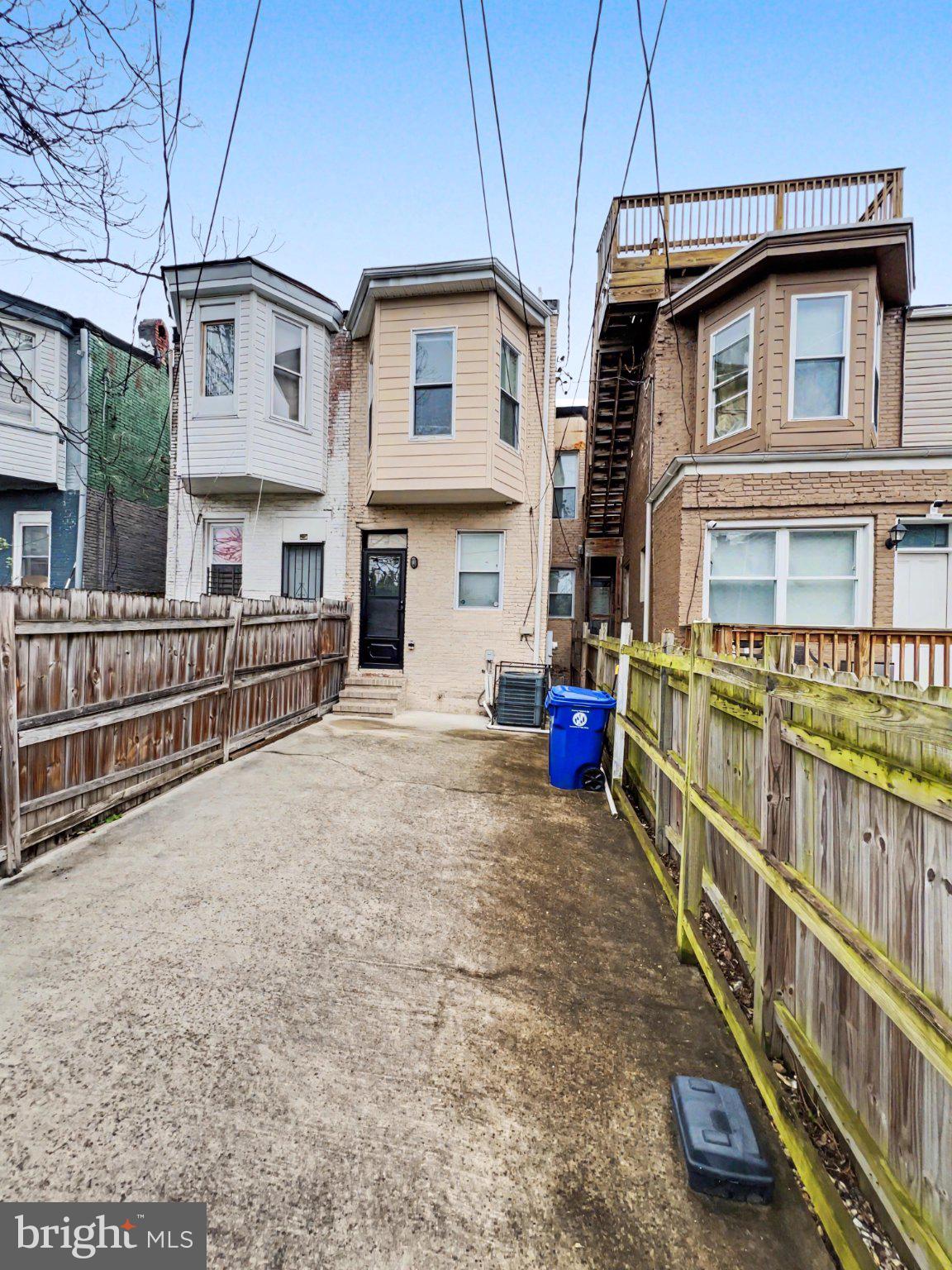1610 North Broadway Baltimore, MD 21213 - Photo 18 of 18 a view of a house with wooden fence