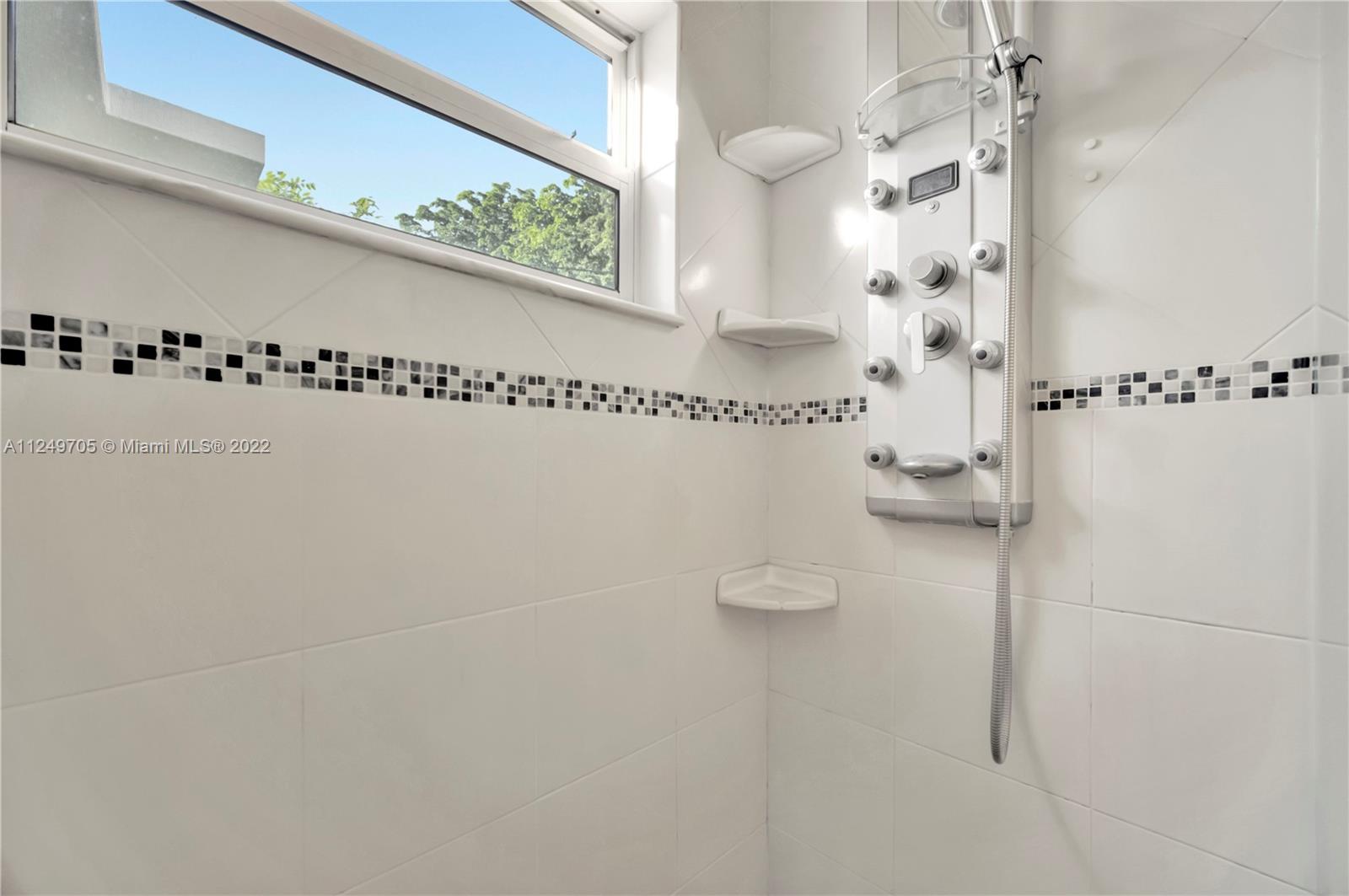 4290 Southwest 11th Street Miami, FL 33134 - Photo 14 of 20 a bathroom with a shower