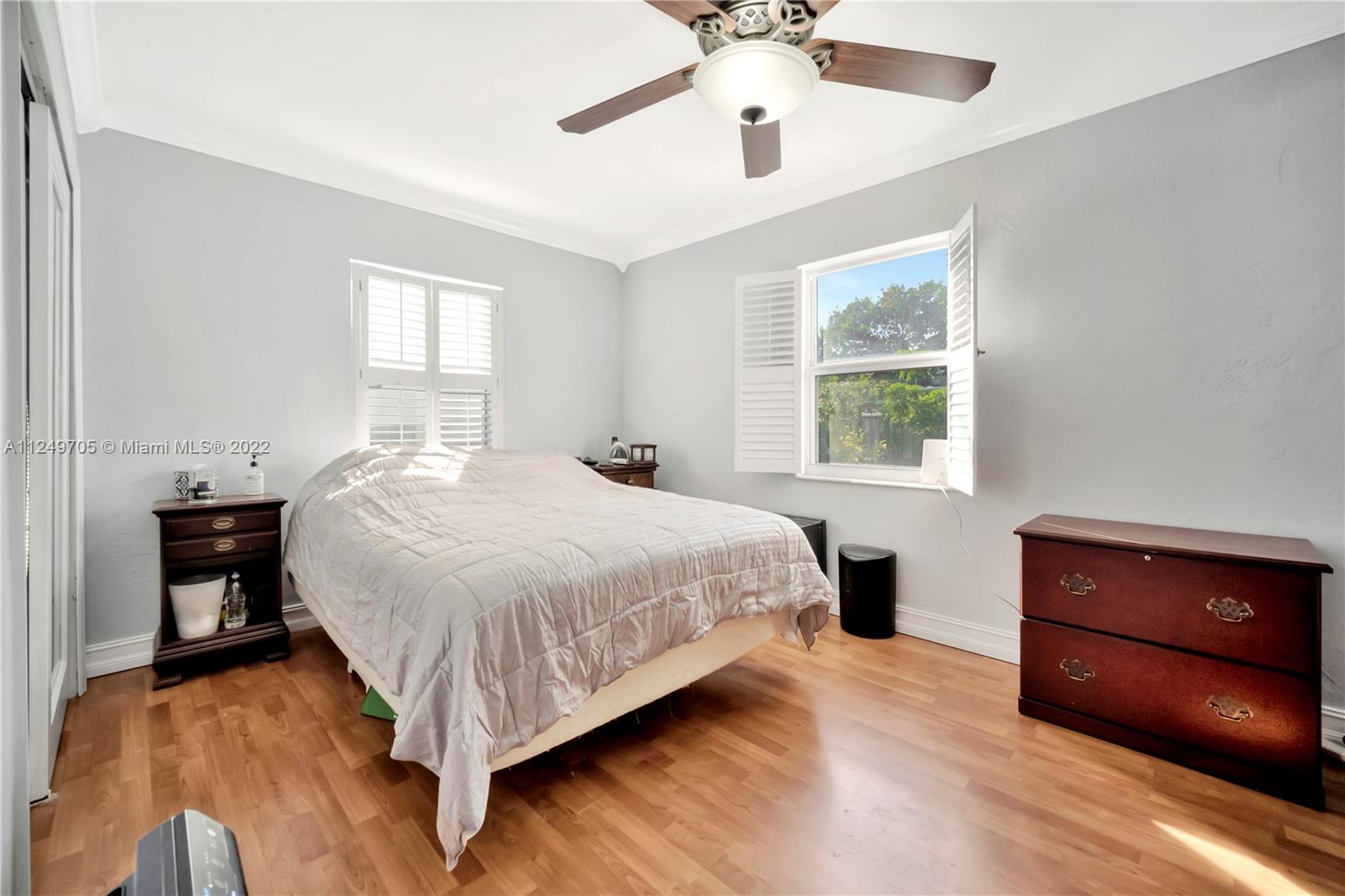 4290 Southwest 11th Street Miami, FL 33134 - Photo 18 of 20 a bedroom with a bed and window