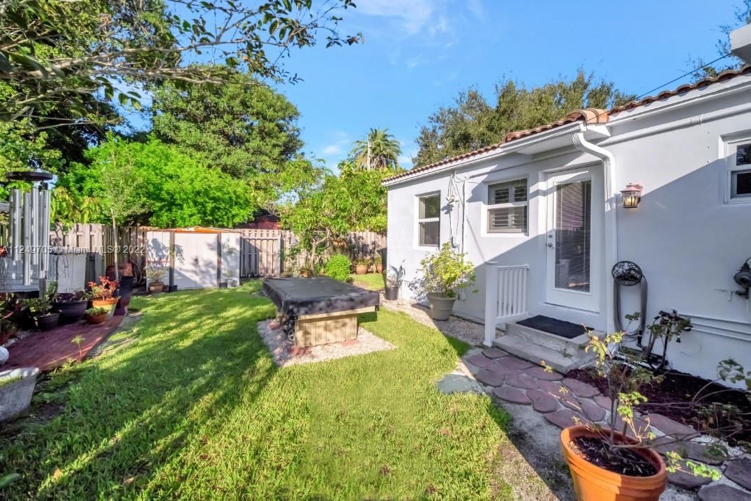4290 Southwest 11th Street Miami, FL 33134 - Photo 19 of 20 a view of a backyard with sitting area