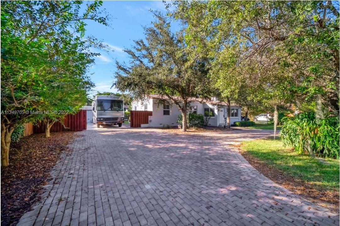 4290 Southwest 11th Street Miami, FL 33134 - Photo 2 of 20 a view of a house with tree s