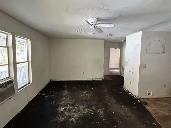 en empty room with windows