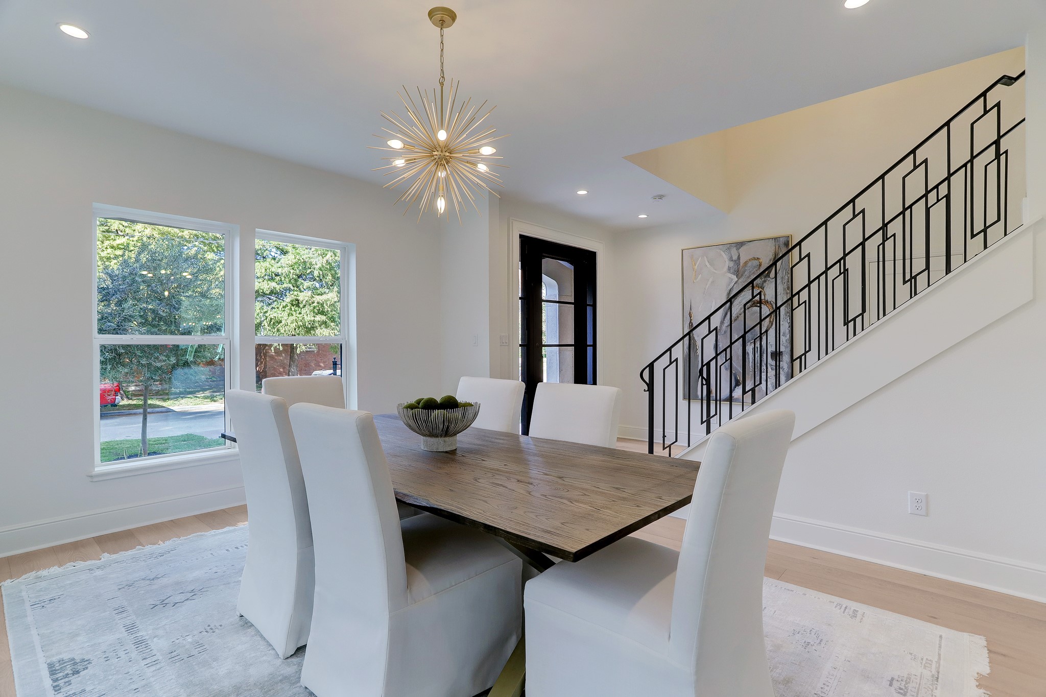 1601 Bonnie Brae Street Houston, TX 77006 - Photo 11 of 39 a view of a dining room with furniture window and wooden floor