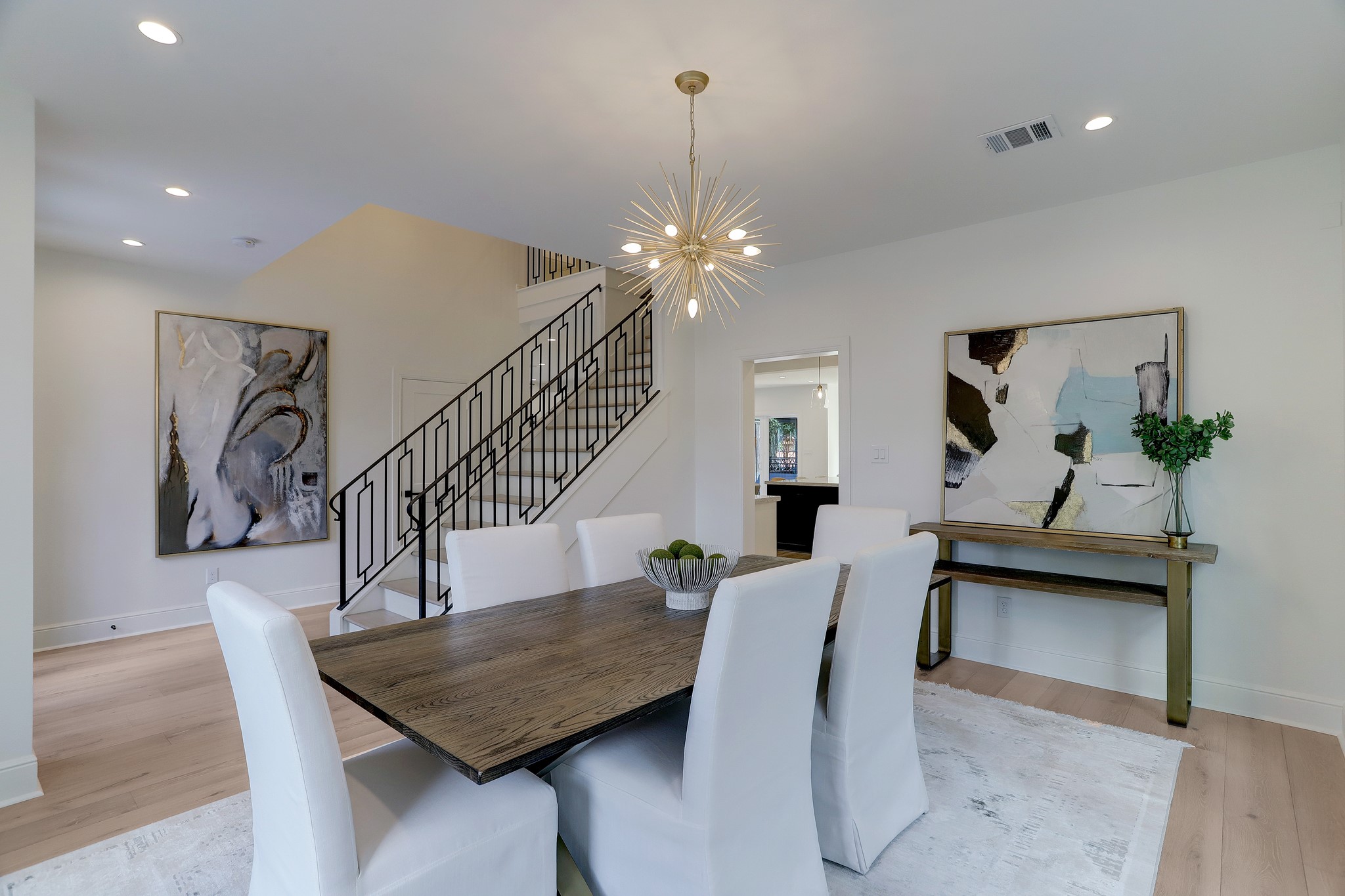1601 Bonnie Brae Street Houston, TX 77006 - Photo 12 of 39 a dining room with furniture and wooden floor