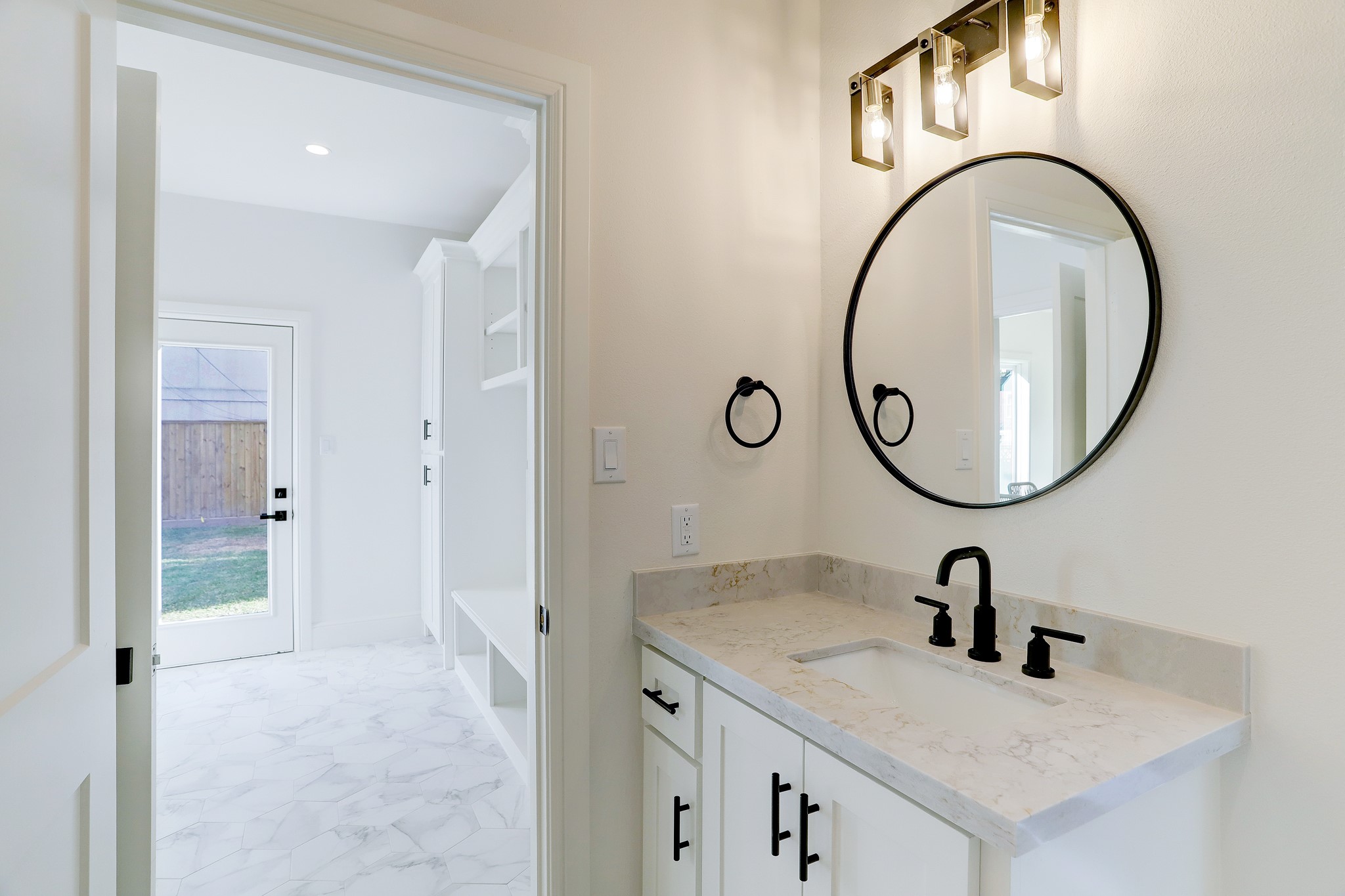 1601 Bonnie Brae Street Houston, TX 77006 - Photo 21 of 39 a bathroom with a sink and a mirror