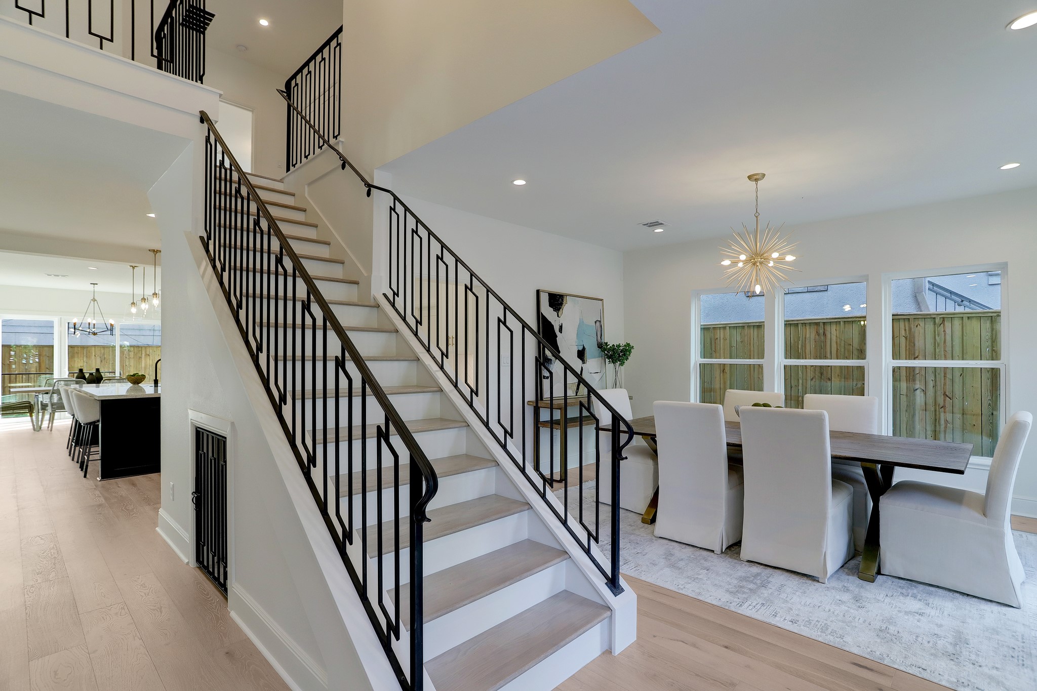 1601 Bonnie Brae Street Houston, TX 77006 - Photo 10 of 39 a view of a livingroom with wooden floor and windows