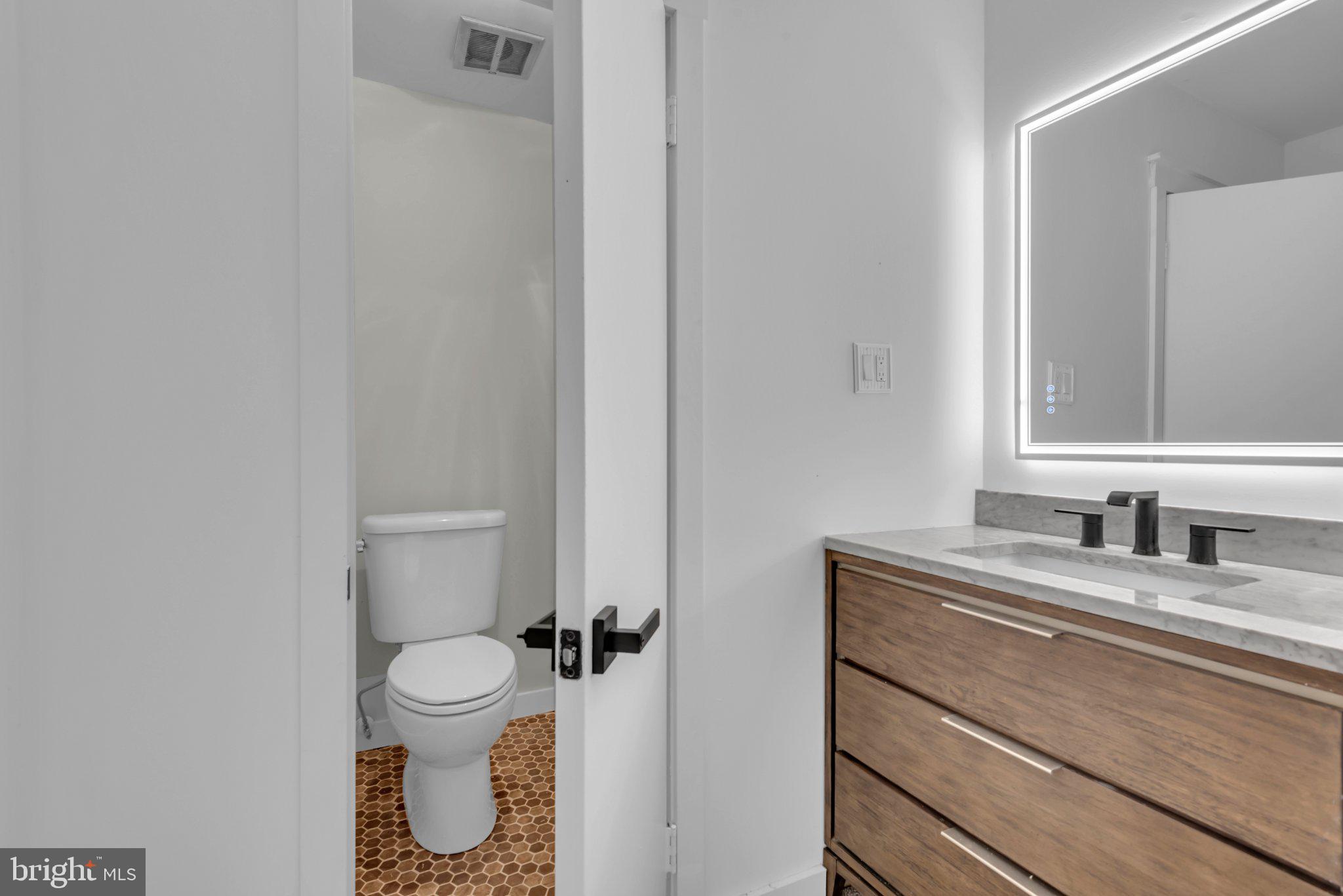 1836 Ralston Place Crofton, MD 21114 - Photo 34 of 42 Sleek modern bathroom with stylish finishes.
