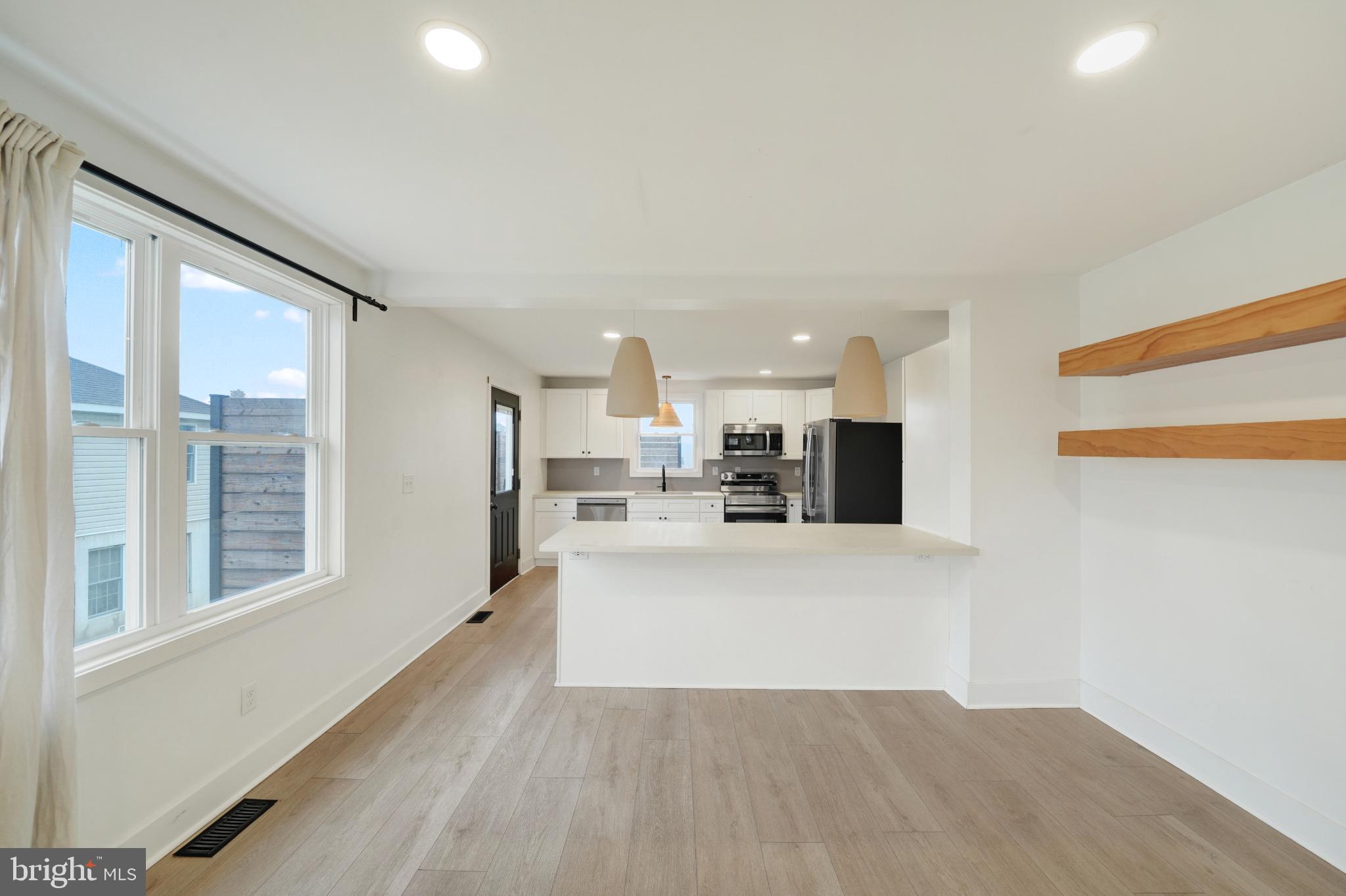 23 Old Bayview Road North East, MD 21901 - Photo 12 of 28 Bright and airy modern kitchen space.