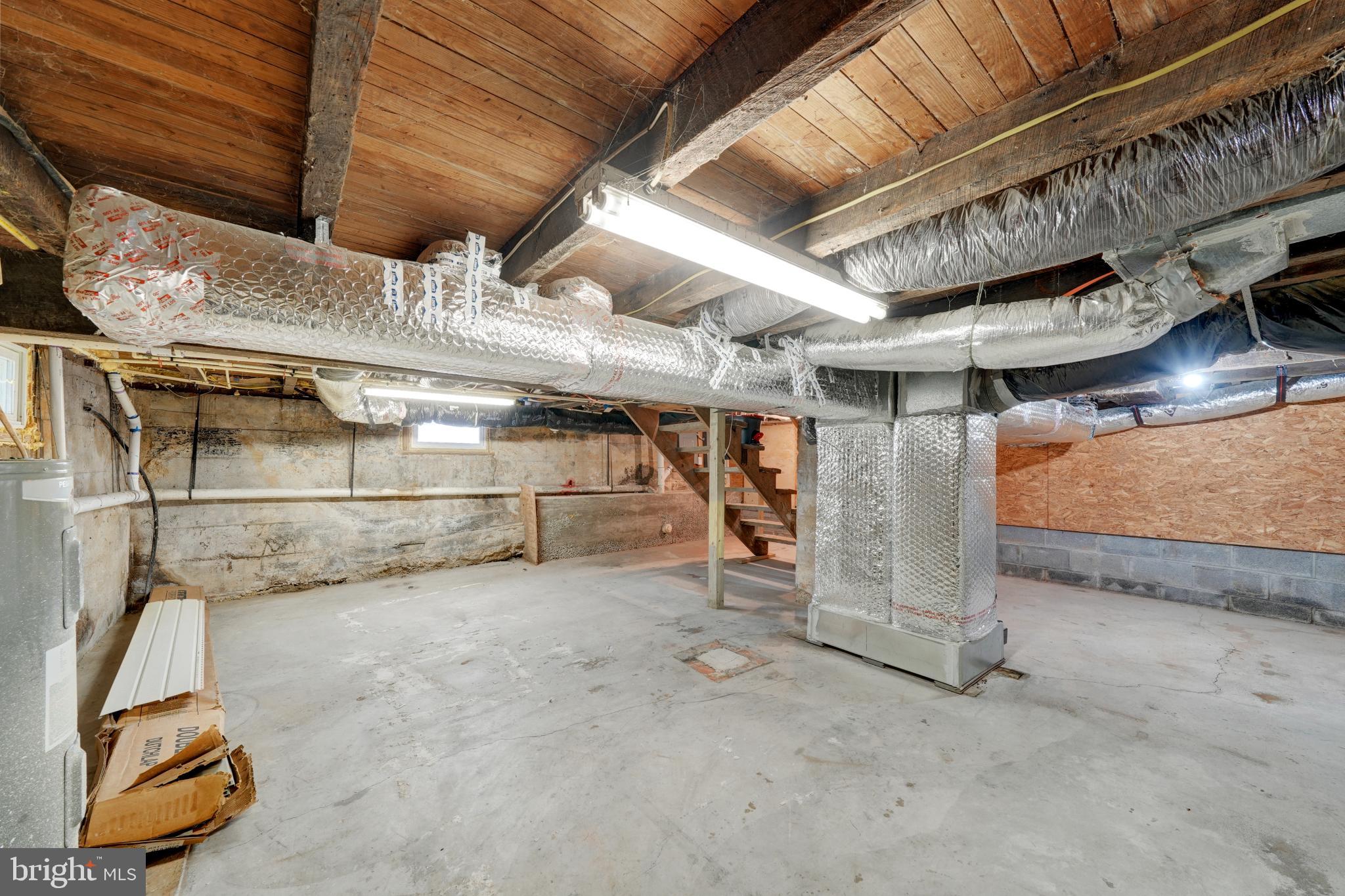 23 Old Bayview Road North East, MD 21901 - Photo 28 of 28 Spacious basement with exposed beams.