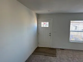 an empty room with windows