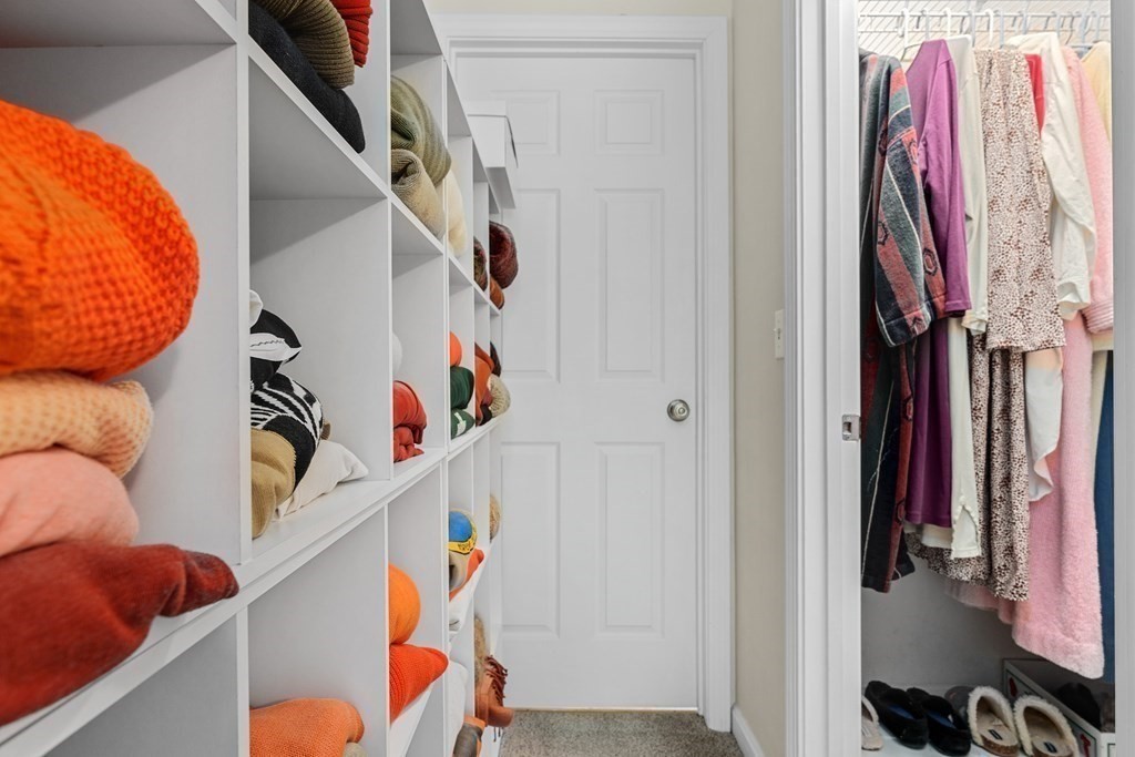 11 Longley Road, Unit H1 Shirley, MA 01464 - Photo 13 of 35 a view of walk in closet with clothes and shoes