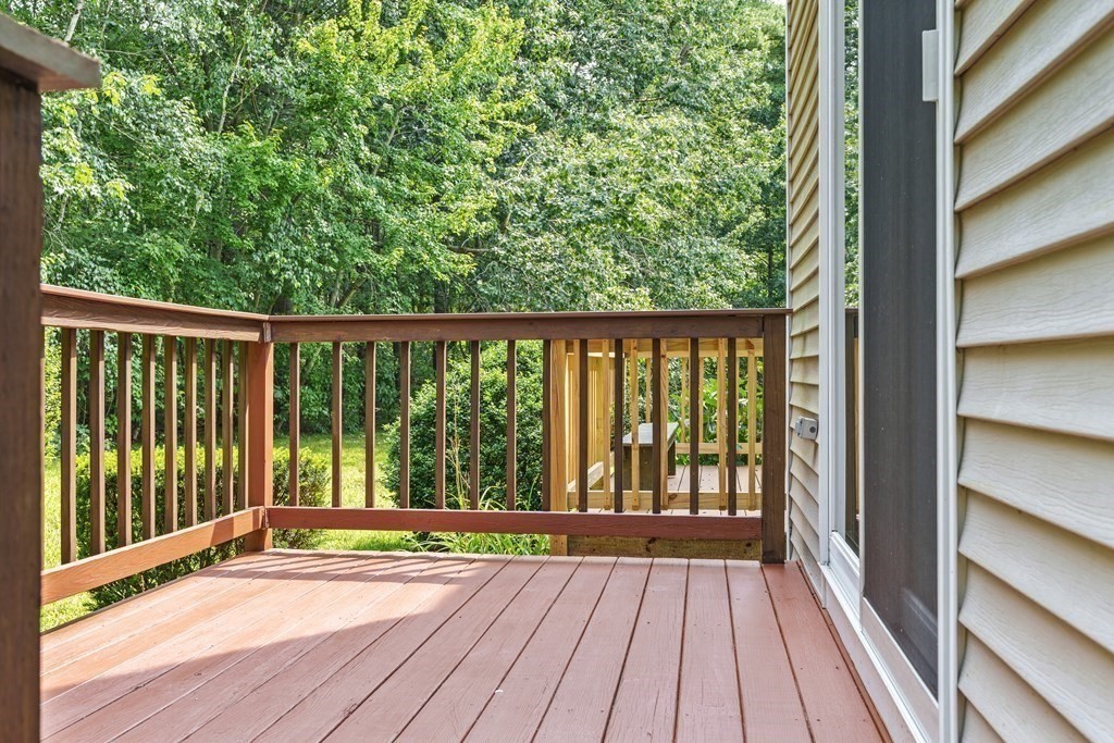 11 Longley Road, Unit H1 Shirley, MA 01464 - Photo 27 of 35 a view of balcony with wooden floor