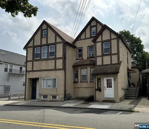 a front view of a house with a garage