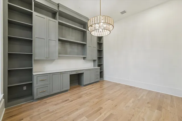 a view of cabinets and window