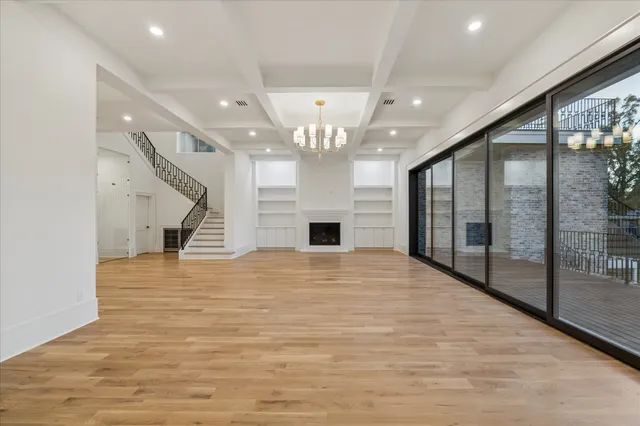 a view of a hallway with a chandelier
