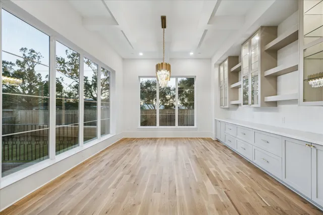 a view of a room with a large window