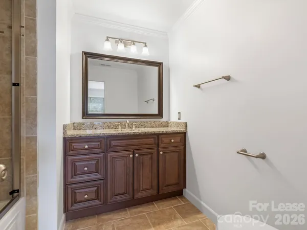 a bathroom with a shower and a bathtub
