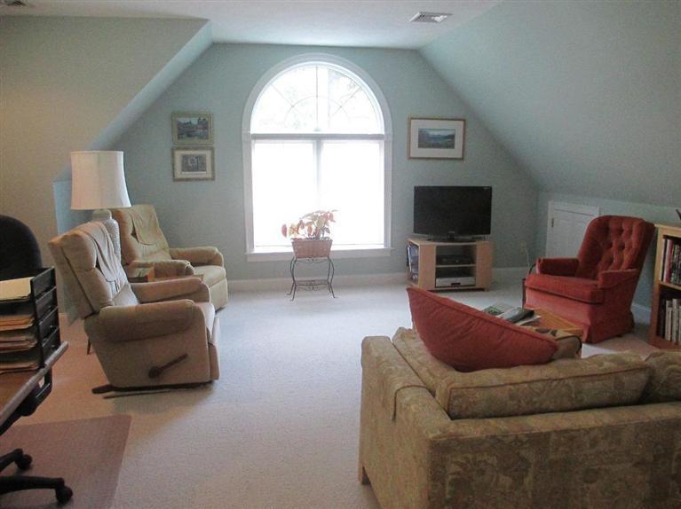 95 Cairn Ridge Road East Falmouth, MA 02536 - Photo 13 of 33 a living room with furniture and a flat screen tv