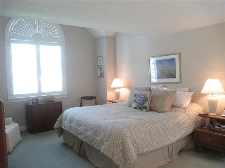 95 Cairn Ridge Road East Falmouth, MA 02536 - Photo 15 of 33 a bedroom with a bed and a window