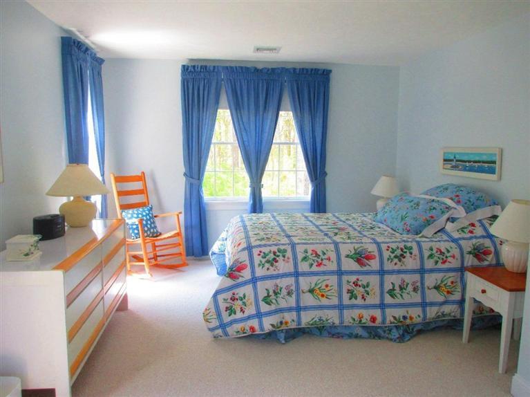 95 Cairn Ridge Road East Falmouth, MA 02536 - Photo 19 of 33 a bedroom with a bed and a window